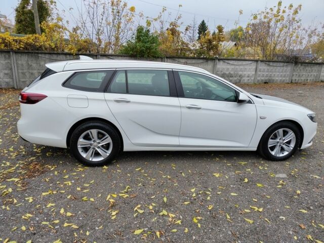 Белый Опель Инсигния, объемом двигателя 2 л и пробегом 245 тыс. км за 15700 $, фото 5 на Automoto.ua