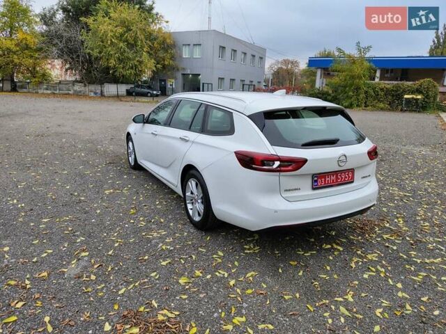 Білий Опель Інсігнія, об'ємом двигуна 2 л та пробігом 245 тис. км за 15700 $, фото 2 на Automoto.ua