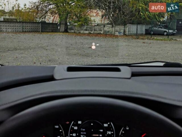 Білий Опель Інсігнія, об'ємом двигуна 2 л та пробігом 245 тис. км за 15700 $, фото 25 на Automoto.ua