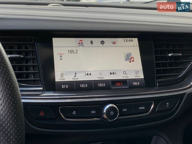 Білий Опель Інсігнія, об'ємом двигуна 2 л та пробігом 261 тис. км за 13299 $, фото 53 на Automoto.ua