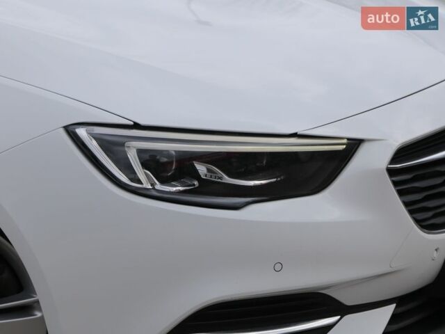 Белый Опель Инсигния, объемом двигателя 2 л и пробегом 240 тыс. км за 15900 $, фото 3 на Automoto.ua