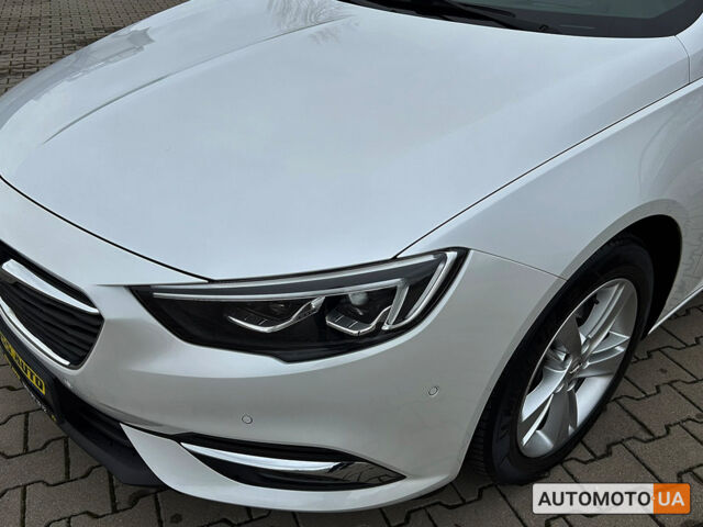 Белый Опель Инсигния, объемом двигателя 2 л и пробегом 38 тыс. км за 25400 $, фото 7 на Automoto.ua