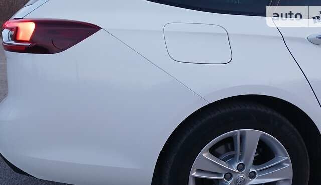 Білий Опель Інсігнія, об'ємом двигуна 1.6 л та пробігом 153 тис. км за 16545 $, фото 30 на Automoto.ua