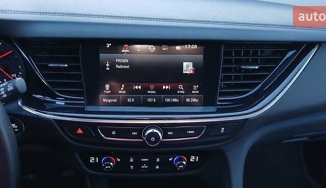 Білий Опель Інсігнія, об'ємом двигуна 1.6 л та пробігом 153 тис. км за 16545 $, фото 64 на Automoto.ua