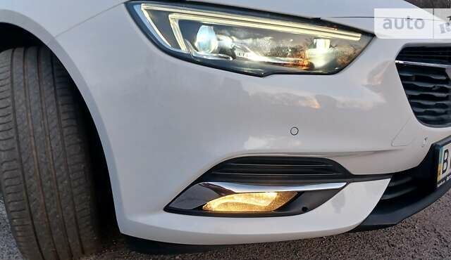 Білий Опель Інсігнія, об'ємом двигуна 1.6 л та пробігом 153 тис. км за 16545 $, фото 14 на Automoto.ua