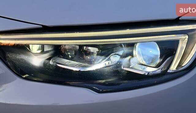 Білий Опель Інсігнія, об'ємом двигуна 1.6 л та пробігом 153 тис. км за 16545 $, фото 16 на Automoto.ua