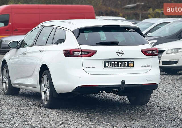 Белый Опель Инсигния, объемом двигателя 1.96 л и пробегом 191 тыс. км за 14900 $, фото 4 на Automoto.ua