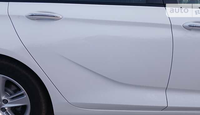 Білий Опель Інсігнія, об'ємом двигуна 1.6 л та пробігом 153 тис. км за 16545 $, фото 32 на Automoto.ua