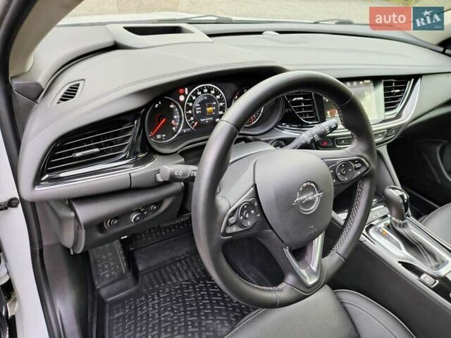 Білий Опель Інсігнія, об'ємом двигуна 2 л та пробігом 245 тис. км за 15700 $, фото 21 на Automoto.ua