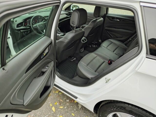 Білий Опель Інсігнія, об'ємом двигуна 2 л та пробігом 245 тис. км за 15100 $, фото 8 на Automoto.ua