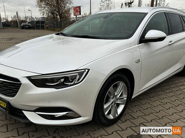 Белый Опель Инсигния, объемом двигателя 2 л и пробегом 38 тыс. км за 25400 $, фото 6 на Automoto.ua