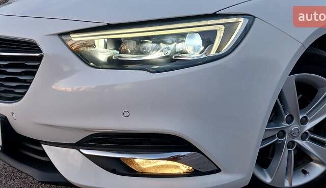 Білий Опель Інсігнія, об'ємом двигуна 1.6 л та пробігом 153 тис. км за 16545 $, фото 18 на Automoto.ua