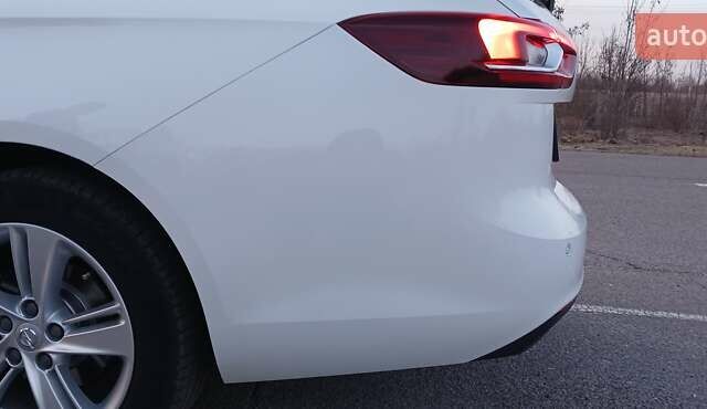 Білий Опель Інсігнія, об'ємом двигуна 1.6 л та пробігом 153 тис. км за 16545 $, фото 24 на Automoto.ua