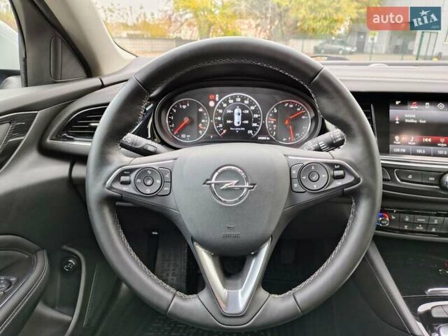 Білий Опель Інсігнія, об'ємом двигуна 2 л та пробігом 245 тис. км за 15700 $, фото 16 на Automoto.ua