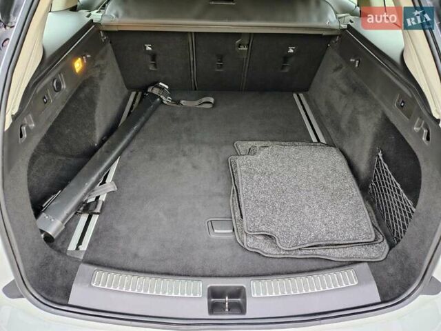 Білий Опель Інсігнія, об'ємом двигуна 2 л та пробігом 245 тис. км за 15700 $, фото 28 на Automoto.ua