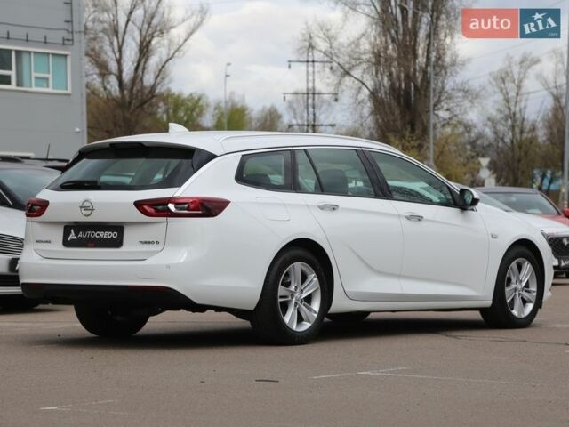 Белый Опель Инсигния, объемом двигателя 2 л и пробегом 240 тыс. км за 15900 $, фото 6 на Automoto.ua