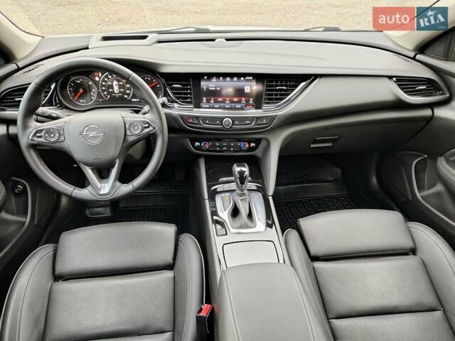 Білий Опель Інсігнія, об'ємом двигуна 2 л та пробігом 245 тис. км за 15700 $, фото 15 на Automoto.ua