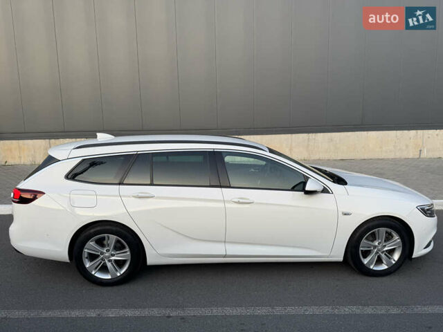 Белый Опель Инсигния, объемом двигателя 1.96 л и пробегом 184 тыс. км за 15600 $, фото 7 на Automoto.ua