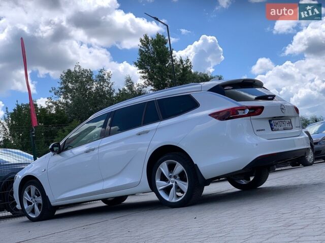 Білий Опель Інсігнія, об'ємом двигуна 2 л та пробігом 261 тис. км за 13299 $, фото 18 на Automoto.ua