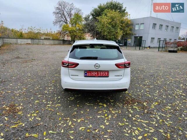 Білий Опель Інсігнія, об'ємом двигуна 2 л та пробігом 245 тис. км за 15700 $, фото 3 на Automoto.ua