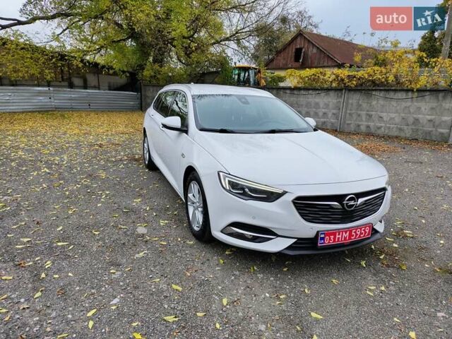 Білий Опель Інсігнія, об'ємом двигуна 2 л та пробігом 245 тис. км за 15700 $, фото 6 на Automoto.ua