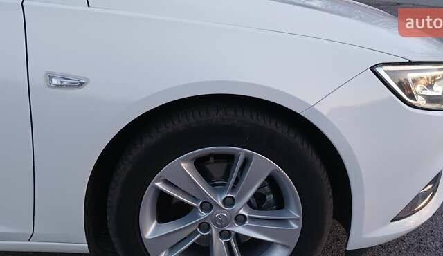 Білий Опель Інсігнія, об'ємом двигуна 1.6 л та пробігом 153 тис. км за 16545 $, фото 34 на Automoto.ua