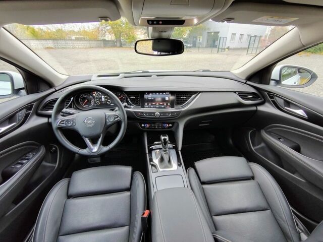 Білий Опель Інсігнія, об'ємом двигуна 2 л та пробігом 245 тис. км за 15100 $, фото 11 на Automoto.ua