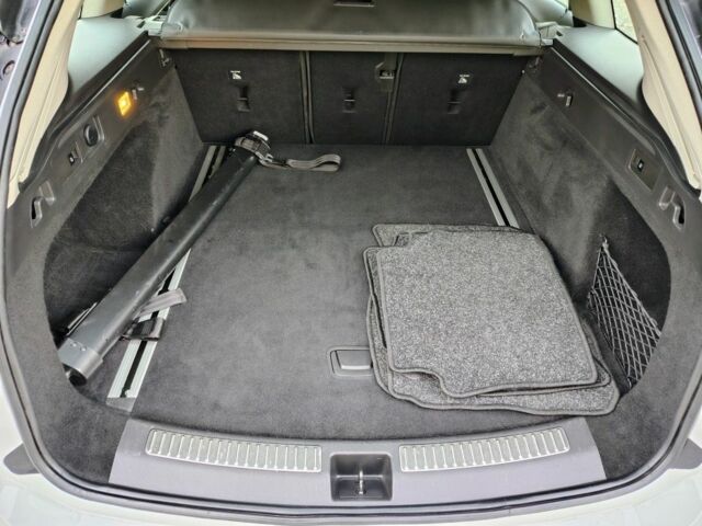 Белый Опель Инсигния, объемом двигателя 2 л и пробегом 245 тыс. км за 15700 $, фото 14 на Automoto.ua