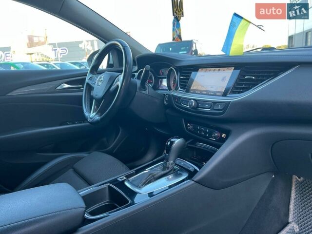 Белый Опель Инсигния, объемом двигателя 2 л и пробегом 228 тыс. км за 12490 $, фото 41 на Automoto.ua