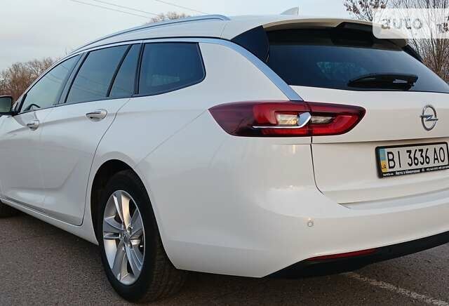 Білий Опель Інсігнія, об'ємом двигуна 1.6 л та пробігом 153 тис. км за 16545 $, фото 8 на Automoto.ua