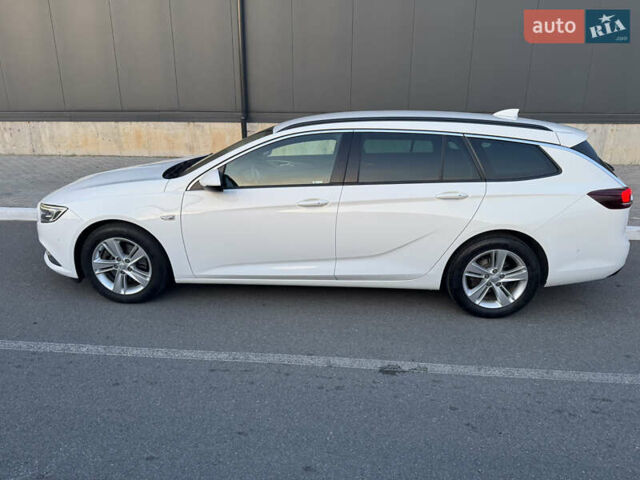 Белый Опель Инсигния, объемом двигателя 1.96 л и пробегом 184 тыс. км за 15600 $, фото 4 на Automoto.ua