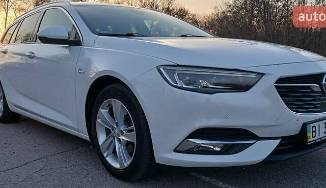 Білий Опель Інсігнія, об'ємом двигуна 1.6 л та пробігом 153 тис. км за 16545 $, фото 5 на Automoto.ua