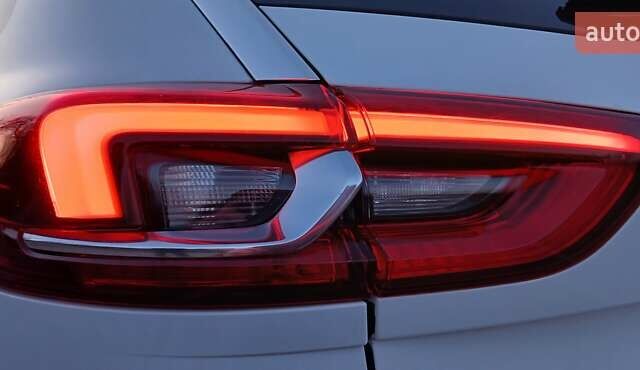 Білий Опель Інсігнія, об'ємом двигуна 1.6 л та пробігом 153 тис. км за 16545 $, фото 25 на Automoto.ua