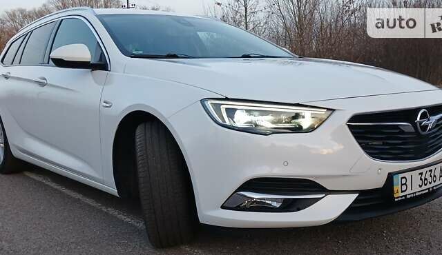 Білий Опель Інсігнія, об'ємом двигуна 1.6 л та пробігом 153 тис. км за 16545 $, фото 11 на Automoto.ua