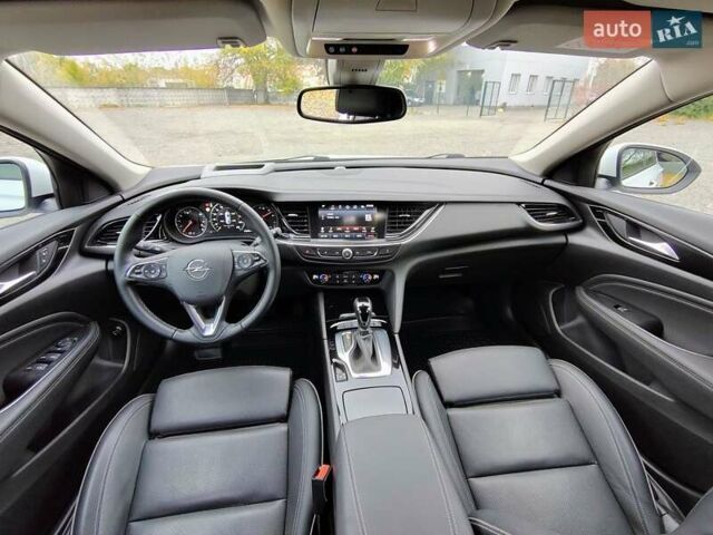 Білий Опель Інсігнія, об'ємом двигуна 2 л та пробігом 245 тис. км за 15700 $, фото 14 на Automoto.ua