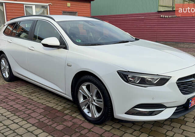 Белый Опель Инсигния, объемом двигателя 1.96 л и пробегом 149 тыс. км за 15900 $, фото 4 на Automoto.ua