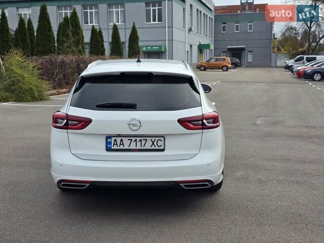 Білий Опель Інсігнія, об'ємом двигуна 2 л та пробігом 225 тис. км за 16500 $, фото 5 на Automoto.ua