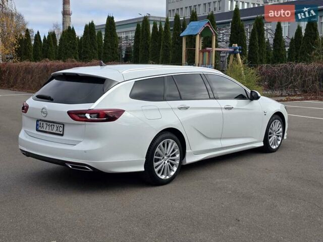 Білий Опель Інсігнія, об'ємом двигуна 2 л та пробігом 225 тис. км за 16500 $, фото 4 на Automoto.ua