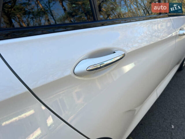 Белый Опель Инсигния, объемом двигателя 2 л и пробегом 227 тыс. км за 15400 $, фото 30 на Automoto.ua