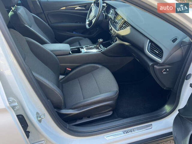 Белый Опель Инсигния, объемом двигателя 2 л и пробегом 227 тыс. км за 15400 $, фото 25 на Automoto.ua