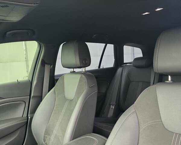 Білий Опель Інсігнія, об'ємом двигуна 2 л та пробігом 225 тис. км за 16500 $, фото 31 на Automoto.ua