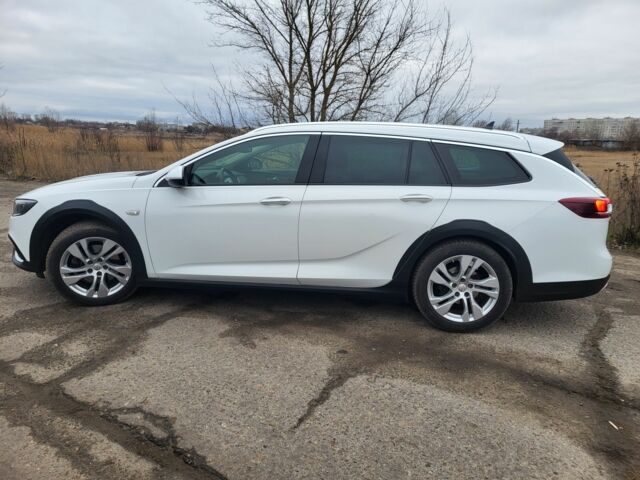 Білий Опель Інсігнія, об'ємом двигуна 2 л та пробігом 230 тис. км за 15400 $, фото 5 на Automoto.ua