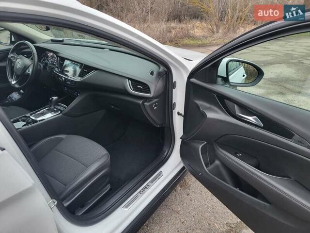 Белый Опель Инсигния, объемом двигателя 2 л и пробегом 231 тыс. км за 15500 $, фото 9 на Automoto.ua