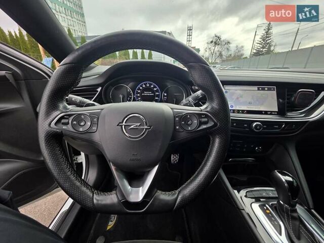 Білий Опель Інсігнія, об'ємом двигуна 2 л та пробігом 225 тис. км за 16500 $, фото 23 на Automoto.ua