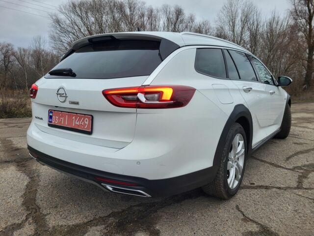 Білий Опель Інсігнія, об'ємом двигуна 2 л та пробігом 230 тис. км за 15400 $, фото 4 на Automoto.ua