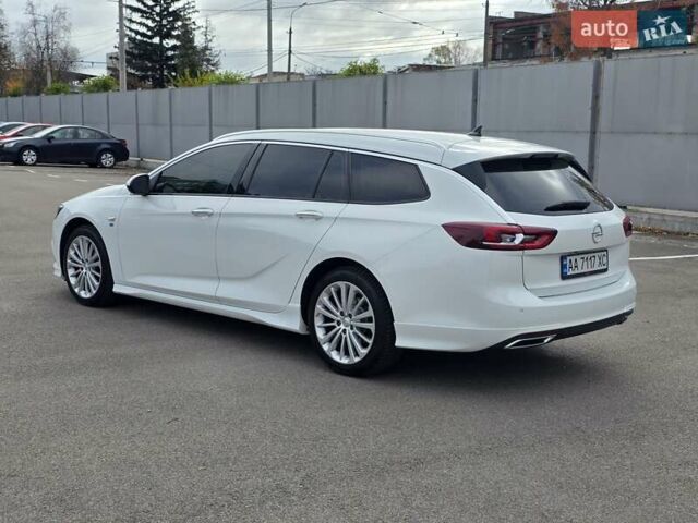 Білий Опель Інсігнія, об'ємом двигуна 2 л та пробігом 225 тис. км за 16500 $, фото 6 на Automoto.ua