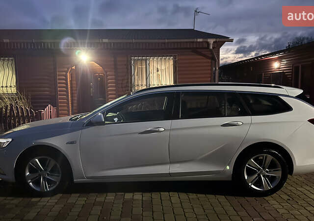 Білий Опель Інсігнія, об'ємом двигуна 1.96 л та пробігом 149 тис. км за 15500 $, фото 6 на Automoto.ua