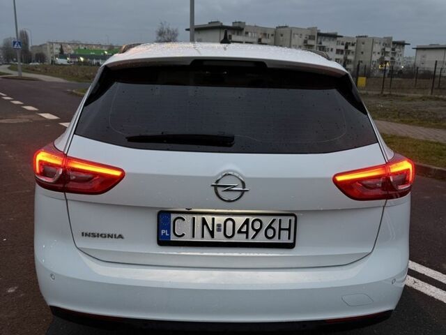 Білий Опель Інсігнія, об'ємом двигуна 2 л та пробігом 178 тис. км за 13000 $, фото 4 на Automoto.ua
