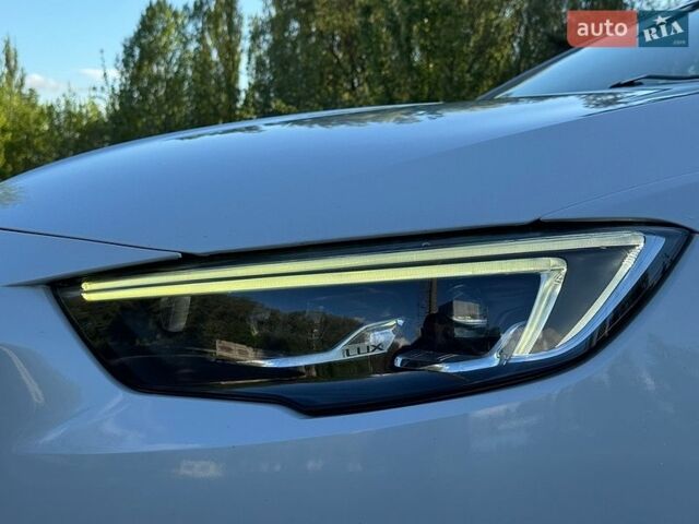 Белый Опель Инсигния, объемом двигателя 2 л и пробегом 223 тыс. км за 16200 $, фото 11 на Automoto.ua