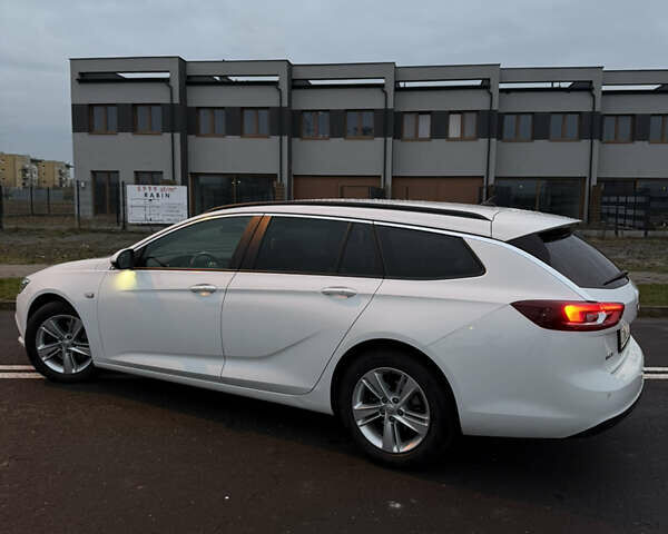 Белый Опель Инсигния, объемом двигателя 2 л и пробегом 178 тыс. км за 14000 $, фото 2 на Automoto.ua